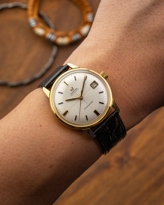 Omega Seamaster Automatic Date Crosshair dial Gold Ref. 166.002 (Cal. 565)