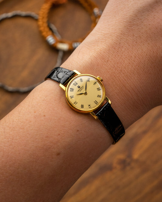 Universal Geneve Seal Script dial Mini Gold Ref. 542605 (Cal. 1-42)