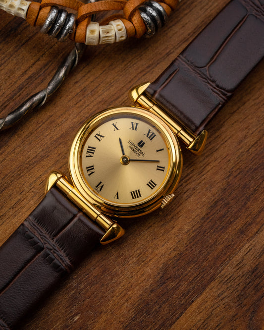 Universal Geneve “Convertible Cow Horn Lugs” Roman dial Gold Ref. 542678 (Cal. 1-42)