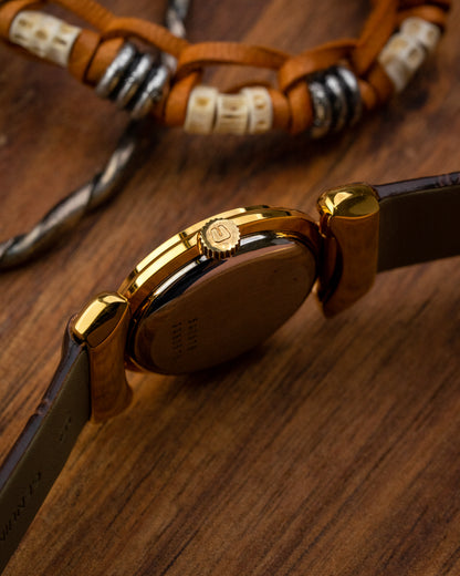 Universal Geneve “Convertible Cow Horn Lugs” Roman dial Gold Ref. 542678 (Cal. 1-42)
